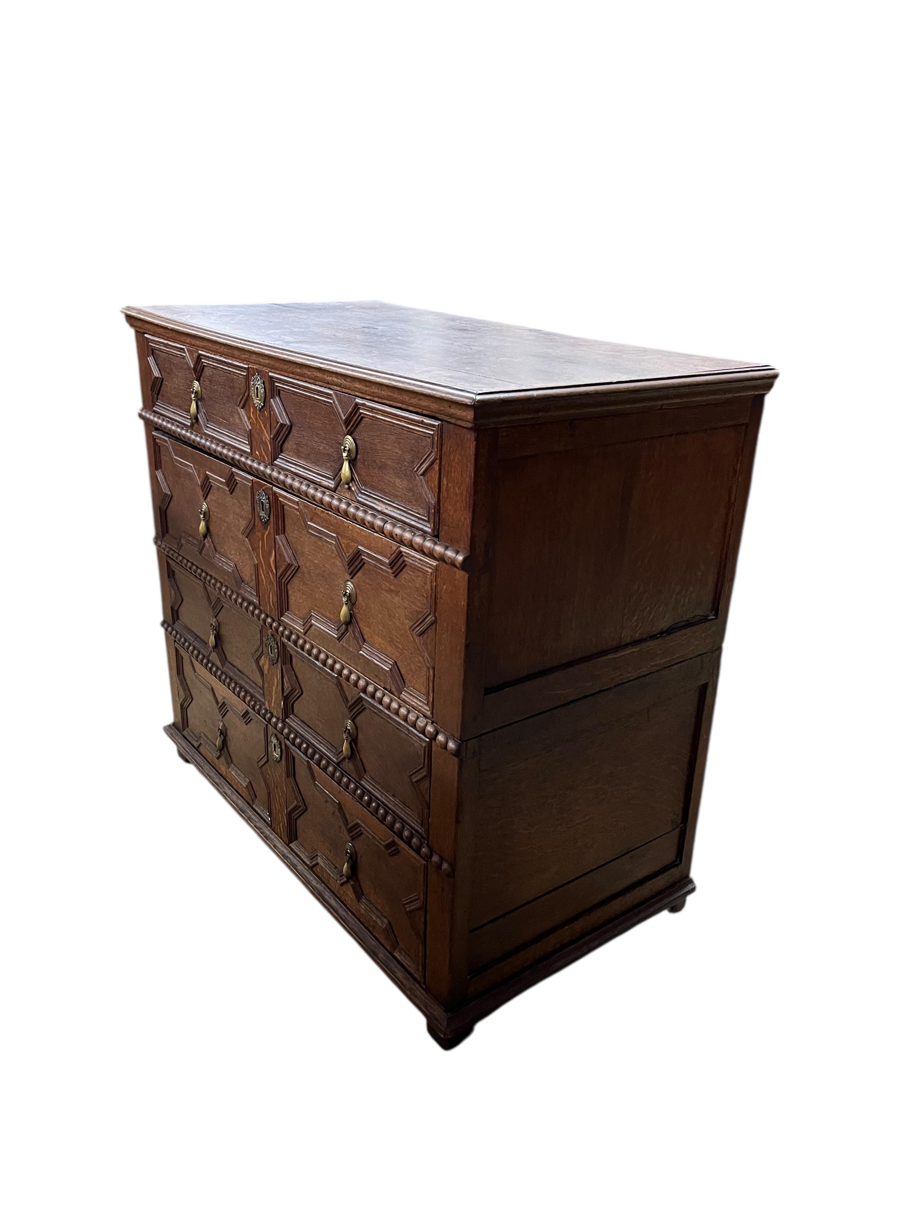 An early 18th century oak two part chest of drawers, width 102cm, depth 53cm, height 93cm